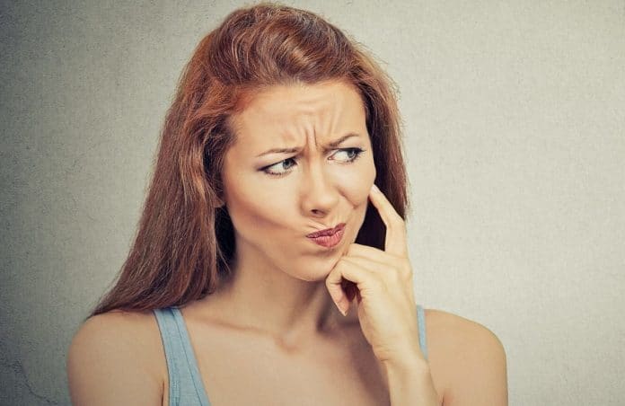 thoughtful-skeptical-suspicious-young-woman_1525770168